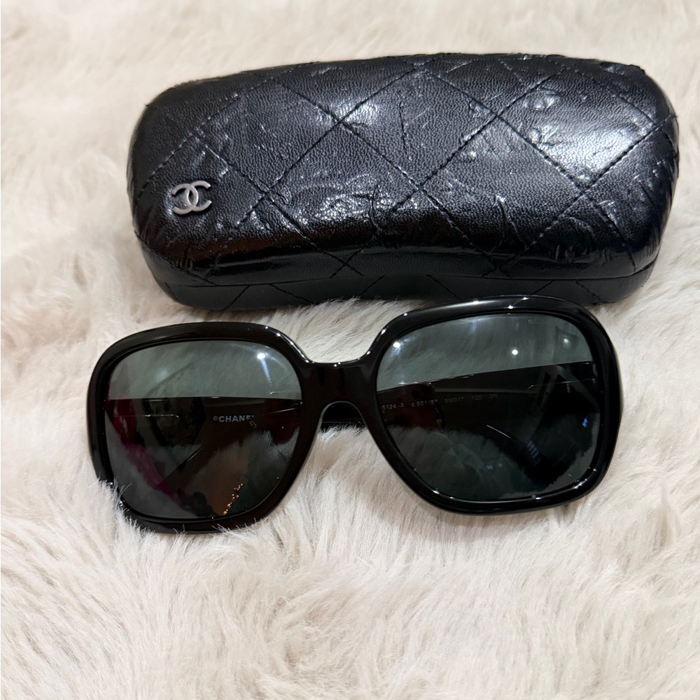 CHANEL Elegant Black Sunglasses with Quilted Case